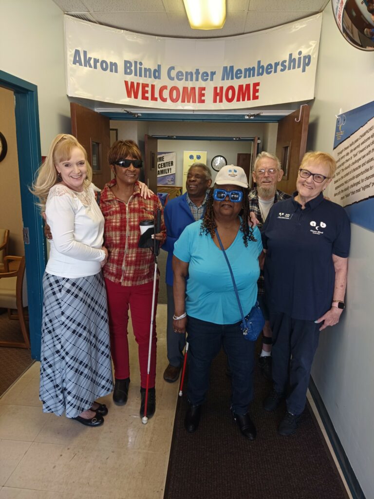 Photo of smiling people at the Akron Blind Center